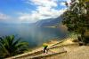 "Lago de Atitlan" — Three towering volcanoes overlook the lake: San Pedro at 2,995m, Toliman at 3,134m, and Atitlan at 3,537m
