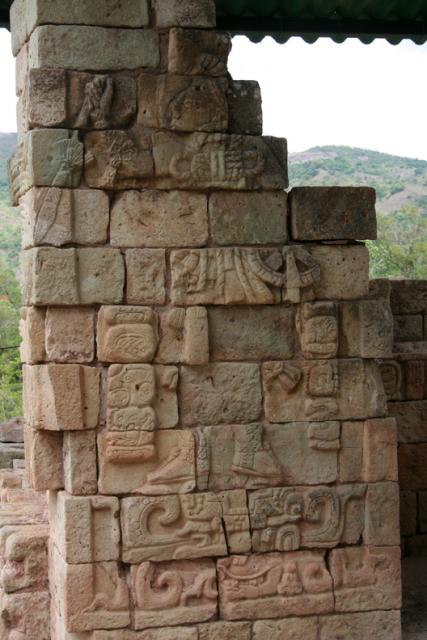 Passing along the outer rim of the ruins complex, I came upon this magnificent relief of a figure wielding a large sword.  